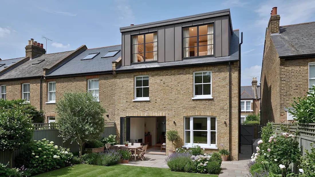 Dormer loft conversion, Wandsworth, London | Sovran Group Dormer loft conversion in Wandsworth, London — zinc-clad box dormer above a bifold-door rear extension, by Sovran Group